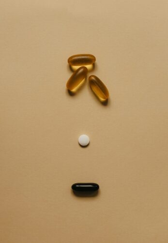 Pills against a golden background.