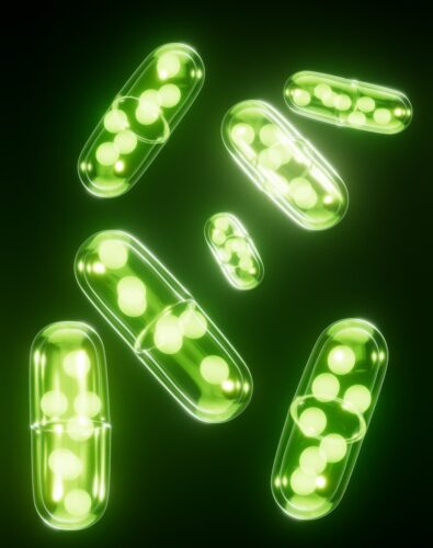 Transparent capsules that contain glowing materials inside.