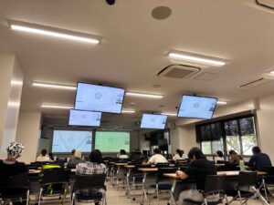 A back view from one of the lecture sessions, capturing the immersive learning atmosphere.