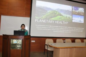 Photo of. Dr. Joshitha Sankam Outreach delivering a talk on Planetary Health at a climate change and health training program for health professionals by Divecha Centre for Climate Change on February 4, 2023.